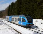 Am 19.03. 2013 erwischte ich den fr die steirische S-Bahn werbenden GTW 5062 003 der STLB als R8682 auf dem Weg von Graz nach Gleisdorf, in Thomsche kurz vor dem 531 Meter langen Lanitz-Tunnel.