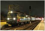 1010.10 mit SDZ D16643 von Linz nach Wien. Hier beim Halt in Wien/Meidling, 12.12.2009