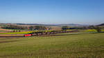 1016 003 fährt mit einem Kesselzug bei Ollersbach in Richtung St.