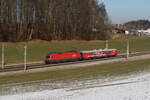 1016 035 war mit dem  Rail Checker  am 19. Februar 2025 bei Axdorf in Richtung Rosenheim unterwegs.