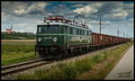 1041.15 beschleunigt den Schlackezug 61891 aus dem Bahnhof Hausleiten in Richtung Moosbierbaum.