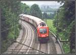 1116 164 rollt am Zugschluss des OEC 161  Maria Theresia  gefhrt von 1116 135 ber die Inntalbahn nach Wien West.