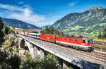 1144 223-5 und 1116 187-6 fahren mit der ROLA 43251 (Salzburg - Fernetti) über die neue Angerschluchtbrücke.
Aufgenommen am 30.8.2017.