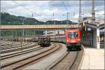 Mit 10 Minuten Versptung rollt die 1116 115  mit dem OEC 162  TRANSALPIN  nach Basel aus dem Bahnhof Kufstein. Gru an den Lokfhrer fr das Fernlicht. (28.06.07) (2)
