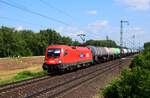 Die 1116 001 ist mit einem Kesselwagenzug kurz vor Komárom in Richtung Győr.
21.07.2024.