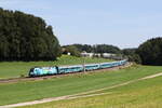 1116 244 war am 15. August 2024 mit dem  Klima-Railjet 2 bei Axdorf in Richtung Rosenheim unterwegs.