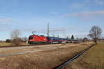 1116 130 war am 24. Januar 2025 mit einer neuen  Nightjet-Garnitur  bei Übersee am Chiemsee in Richtung München unterwegs.