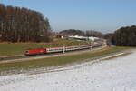 1116 052 war am 19. Februar 2025 mit einem  EC  bei Axdorf auf dem Weg nach München.