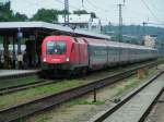 1116 022-3 hat EC25 am Haken; Passau Hbf.