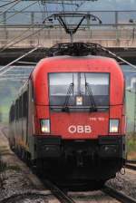 1116 105 mit einem Korridor-Zug am 27. August 2013 in Bernau am Chiemsee.