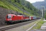 1116 197 + 1142 665 mit Erzug im Bahnhof Landl am 27.05.2015.