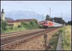 1116 208 bringt im Sommer 2005 den EuroCity84  Michelangelo  vom Brenner nach Mnchen. Aufgenommen beim Kloster Raisach.