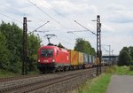 1116 199 von der BB zieht am 11.August 2016 einen KLV-Zug bei Thngersheim in Richtung Gemnden(Main).