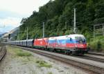 1116.084 und eine Schwesterlok ziehen den Erzzug 58662 von Eisenerz nach Leoben Donawitz in den Bahnhof Leoben Hbf.