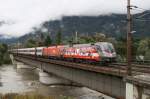 1116 138-9 ``Heeressport`` und 1116 172-6 der BB fahren am 27.9.2012 mit einem Eurocity Bregenz-Wien West ber die Innbrcke kurz vor Brixlegg.