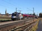 Die 1116 222 mit einem RJ nach Zürich am 27.12.2013 unterwegs bei Stephanskirchen.