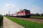 Wenige Minuten nach der SOS-Kinderdorflok kam 1142 636-8 mit R 3417 Obertraun Koppenbrllerhhle - Linz Hbf.,Pasching (sterreichurlaub 18.08.09)