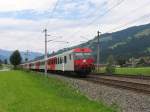 1142 667-3 mit REX 1509 Wrgl Hauptbahnhof-Salzburg Hauptbahnhof bei Brixen im Thale am 11-8-2010.