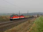 Die 1142 658 und die 1144 058 mit einem Güterzug am 05.04.2014 unterwegs bei Pöndorf.