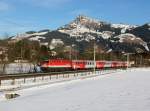 Die 1142 673 mit einem REX nach Innsbruck am 30.01.2016 unterwegs bei Kitzbühel Schwarzsee.