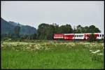 Wie gewohnt bringt im Juni 2005 bei Niederaudorf eine 1144er einen Regionalzug von Innsbruck nach Rosenheim.