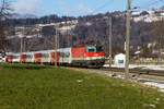 1144 112-0 mit ihrem REX am Nachmittag des 13.2.18 auf dem Weg nach Bludenz in Schwarzach.