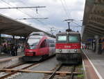 Auf Gleis 1 steht abfahrbereit CityShuttle mit 1144 223 als REX 1523 nach Strasswalchen über Salzburg, daneben 4024 059 als S6 nach Hochfilzen über Kitzbühel; Wörgl, 22.06.2018  
