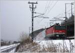 1144 120  Rupert  am 17.01.12 mit REX 7118 in Wien/Nudorf.