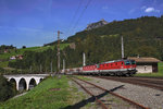 Die frisch lackierte 1144 262 zieht in Doppeltraktion mit der 1144 039-5 in Dalaas einen gemischten Güterzug den Arlberg hinauf.Bild vom 22.9.2016