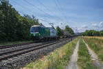 1193 901 ist am 04.07.2023 mit einem Aufliegerzug in Thüngersheim unterwegs