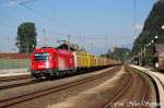 Die eine 1216 weg,kommt schon die Nchste...1216 008-3 jagte mit einem Hackschnitzel-Containerzug gen Innsbruck durch,Brixlegg (sterreichurlaub 20.08.09)