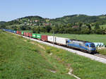 Die 1216 921 brachte am Nachmittag des 14. August 2024 einen Containerzug von Kalsdorf zum Adria Hafen Koper, und wurde dabei von mir in Cirknica fotografiert.