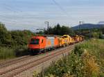 Die 1216 901 mit einem Bauzug am 22.09.2013 unterwegs bei Teisendorf.