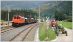 GEG 1245.518 am 10.8.2012 mit dem Fotogterzug 17247 von Admont nach Selzthal, aufgenommen in Frauenberg. Leider ist die Sonne kurz zuvor hinter den Bergen verschwunden.