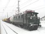 09.03.2005, 1670.09 mit  Speno -Gterzug im Bahnhof Kirchberg in Tirol