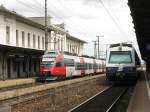 4020 277-2 als S-29584 nach Wien-Floridsdorf (Linie S2) und 4024 100-2 als S-20236 nach Tullnerbach-Pressbaum (Linie S50) in Wien-Htteldorf am 7.06.2009