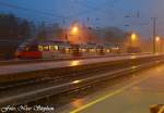 4023 008-8  Stadt Hallein  und ein unerkannt gebliebener Taurus whrend eines starken Wolkenbruches im abendlichen Schwarzach-St.Veit (sterreichurlaub 08.08.09) 