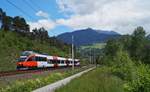 Am 17.05.2020 war der 4024 032-7 mit der Zugleistung des coronabedingt nur bis Steinach in Tirol geführten REX 5220 bei Terfens auf dem Weg in Richtung Innsbruck. Grüße an die dem Fotografen so freundlich winkende Reisende am zweiten Fenster ;)