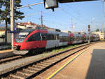 ÖBB 4024 087-1 als S6 nach Garmisch-Partenkirchen bei der Einfahrt in Innsbruck Westbahnhof. Aufgenommen am Abend des 23.07.2021