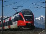 Hier ist die 4024 032 bei voller Fahrt in Schlins als REX nach Bludenz unterwegs (19.3.2010).