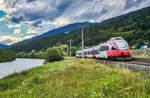 4024 113-5 fährt als S1 4260 (Lienz - Friesach) in die Haltestelle Berg im Drautal ein.