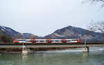 4024 025 als REX 5347 (Brennero/Brenner - Kufstein) bei Brixlegg auf der Innbrücke, 09.03.2019.