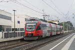 ÖBB 4024 067-3 als REX 5224 durchfährt die Haltestelle Hall-Thaur.