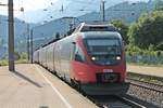 Einfahrt am 02.07.2018 von ÖBB 4024 093-9 als S-Bahn nach Hochfilzen zusammen mit ÖBB 4024 073-1 als S-Bahn nach Kuftsein in den Bahnhof von Fritzens-Wattens.