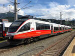 ÖBB 4024 057-3 im neuen CityJet Tirol Design abgestellt in Innsbruck Hbf.