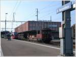 Zweikraftrangierlok Tem III 348 neben 4024 024-4 im Bahnhof St.Margrethen.