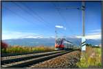 Triebwagen Talent 4024 als REX 1702 aufgenommen zwischen Zeltweg und Knittelfeld.Im Hintergrund sind die Seetaler Alpen mit dem Zirbitzkogel zu sehen.