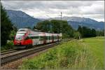 4024 067 fhrt beim Kloster Reisach als RB 5114 von Innsbruck nach Rosenheim.