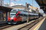 BB Elektro-Talent 4024 006-1 erwartet in Salzburg Hbf Hp1 fr die Weiterfahrt nach Berchtesgaden Hbf.