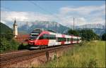 4024 073 ist vor dem Kaisergebirge als RB 5122 von Telfs-Pfaffenhofen nach Rosenheim unterwegs.